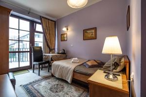 Postel nebo postele na pokoji v ubytování Wawabed Aparthotel