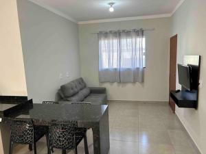 TV a/nebo společenská místnost v ubytování APARTAMENTO em FRANCA 2 SP