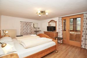 Postel nebo postele na pokoji v ubytování Alpen-Hotel Seimler