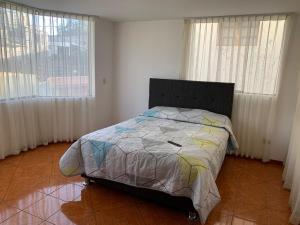 Postel nebo postele na pokoji v ubytování Yanahuara Habitacion Tipo Suite