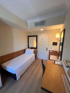 Letto o letti in una camera di Hotel Daniel & Ristorante Cocchi