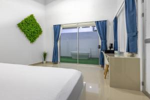 Кровать или кровати в номере The Zion Suite Tortuguero
