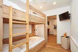 Postel nebo postele na pokoji v ubytování Alpen-Hotel Seimler