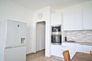 Cucina o angolo cottura di FRONTEMARE Suites