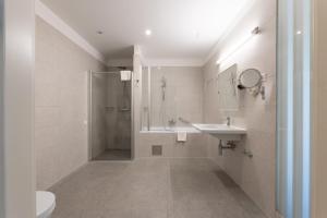 Koupelna v ubytování Hotel Salona Palace