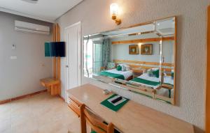 TV a/nebo společenská místnost v ubytování Beau Site Hotel