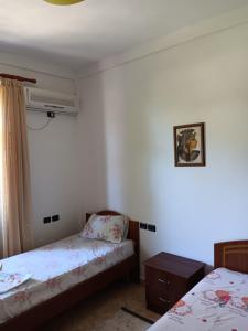 Postel nebo postele na pokoji v ubytování A-Vila