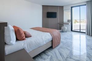 Postel nebo postele na pokoji v ubytování One Resort Premium Hammamet