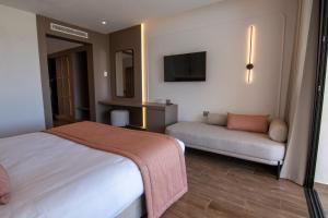 Postel nebo postele na pokoji v ubytování One Resort Premium Hammamet