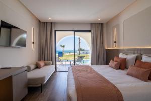 Postel nebo postele na pokoji v ubytování One Resort Premium Hammamet