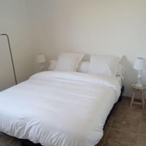 Postel nebo postele na pokoji v ubytování Bastide 3 chambres 6personnes avec piscine sur Aix en Provence