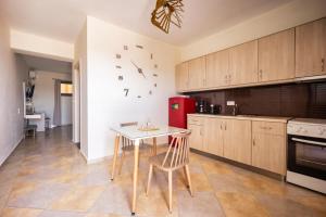Kuchyň nebo kuchyňský kout v ubytování FabView Studio Apartments