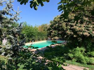 Gallery image of Stanze in villa con parco e piscina in Madonna della Neve