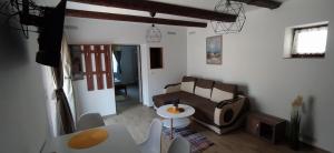 Posedenie v ubytovaní Szigligeti Panoráma Apartmanház