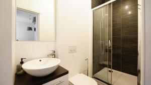 Et badeværelse på Travelers Heaven City Center + 6 billeder