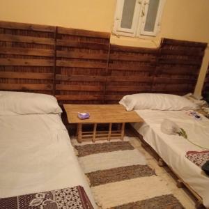 Vuode tai vuoteita majoituspaikassa هوستل أجبناخ إنشالي Hostel Agbenakh Inshaly