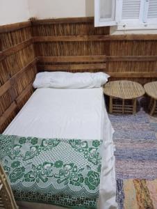 Vuode tai vuoteita majoituspaikassa هوستل أجبناخ إنشالي Hostel Agbenakh Inshaly