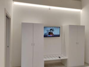 TV a/nebo společenská místnost v ubytování Corte Contessine