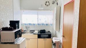 Billede fra billedgalleriet på ゲストハウスROOASiS常磐町501 i Takamatsu