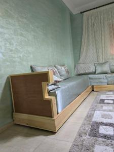 Postel nebo postele na pokoji v ubytování Appartement à louer wadie