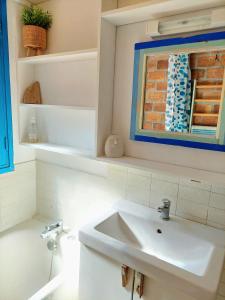 Ванная комната в Maisonnette vue mer
