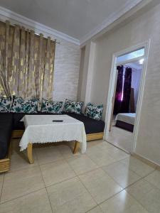 Postel nebo postele na pokoji v ubytování Appartement à louer wadie