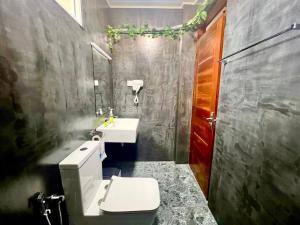 Koupelna v ubytování Easy Stay + 30 fotografií