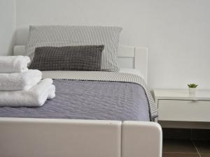 Postel nebo postele na pokoji v ubytování Adria apartmani