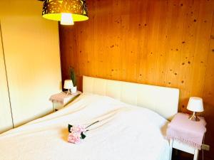 Postel nebo postele na pokoji v ubytování Stella's Holzchalet