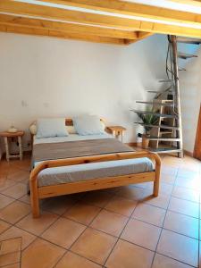 Кровать или кровати в номере Maisonnette vue mer