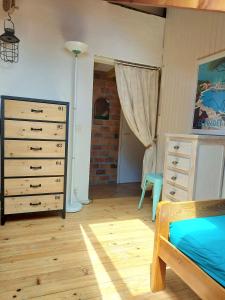 Кровать или кровати в номере Maisonnette vue mer