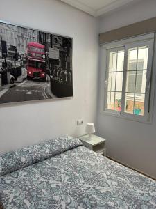 Casa Ciudad Jardín房間的床