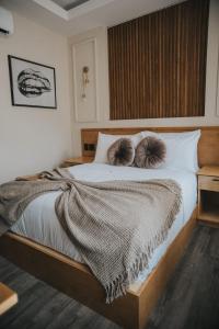 Letto o letti in una camera di Jules & Laurent Hotel Contemporaneo