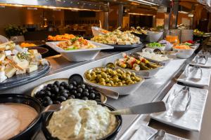a buffet line with many different types of food at HOVIMA Santa Mar&iacute;a in Adeje