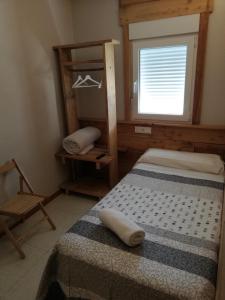 Postel nebo postele na pokoji v ubytování Hostal Ochoa + 14 fotografií