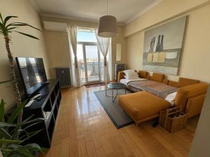 TV a/nebo společenská místnost v ubytování Great View Apartment in the Center of the City
