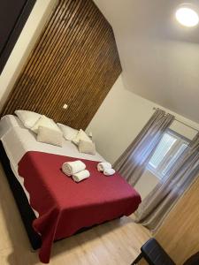 Postel nebo postele na pokoji v ubytování Apartman Leina