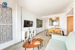 TV a/nebo společenská místnost v ubytování Apartamentos Don Pedro Casa Azahar