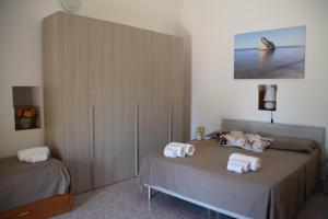 A bed or beds in a room at Casetta in Salento