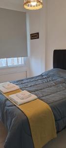 Voodi või voodid majutusasutuse Departamento Monoambiente 2 pers toas