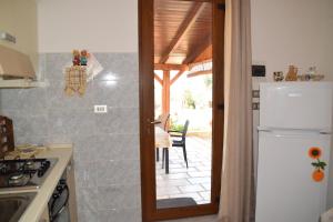 A kitchen or kitchenette at Casetta in Salento