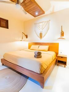 Ένα ή περισσότερα κρεβάτια σε δωμάτιο στο Casita de Diseño con, tina de baño, A/A y TV