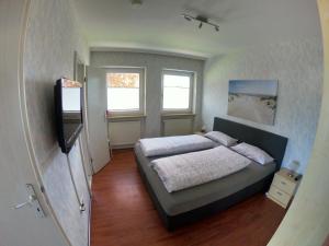 Ένα ή περισσότερα κρεβάτια σε δωμάτιο στο "Gästehaus Siebrecht" - Whg 7 +7 φωτογραφίες