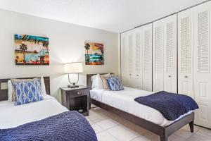 Ένα ή περισσότερα κρεβάτια σε δωμάτιο στο Beachfront Madeira Norte +26 φωτογραφίες