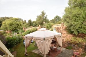 a large white tent in a garden at Villa Venere in Domus de Maria