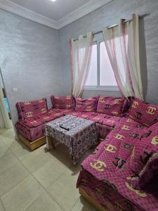 Postel nebo postele na pokoji v ubytování Appartement à louer wadie + 4 fotografie