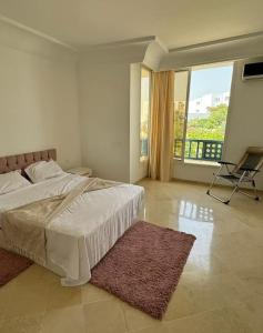 Postel nebo postele na pokoji v ubytování Seaside Luxury Apartment
