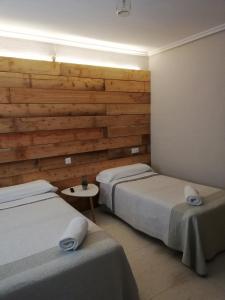 Katil atau katil-katil dalam bilik di Hostal Ochoa +13 gambar