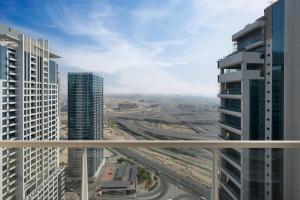 an aerial view of a city with tall buildings at What a view - very close to DMCC metro station in Dubai