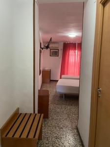 Postel nebo postele na pokoji v ubytování Hotel Iris